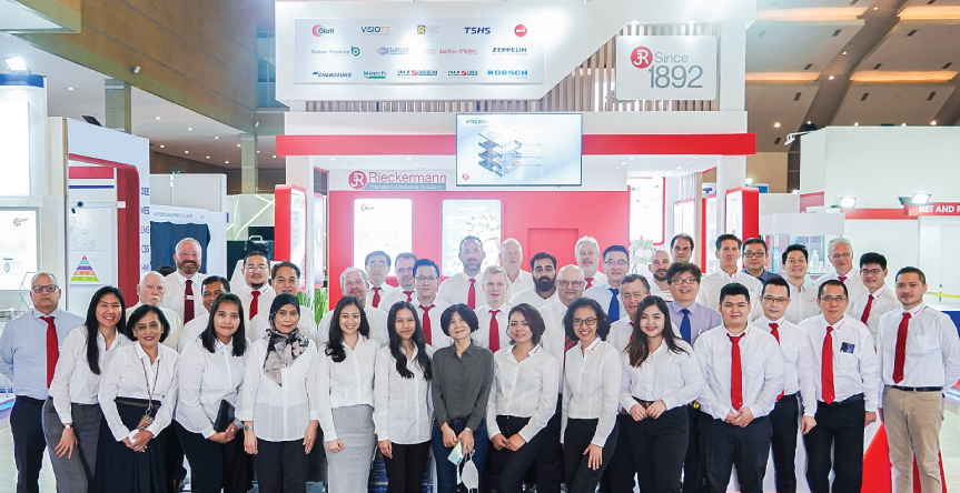 Team in front of Rieckermann booth at Allpack Indonesia 2022