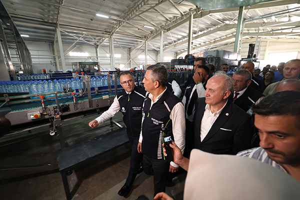 Opening of the new Cene Suyu high-speed water bottling line in Turkey Guests tour the newly commissioned high-speed water bottling line at the Cene Suyu facility in Turkey