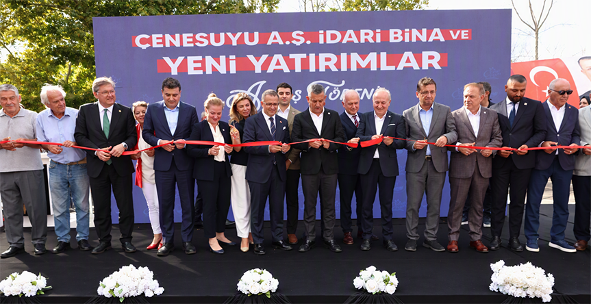 Cene Suyu celebrates the opening of a new high-speed water bottling line in Turkey Cene Suyu executives opening a high-speed water bottling line in Turkey during a ribbon-cutting ceremony with industrial technology supplied by Rieckermann