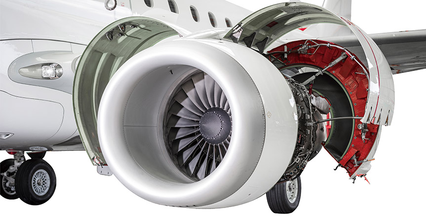 Open airplane engine in hangar